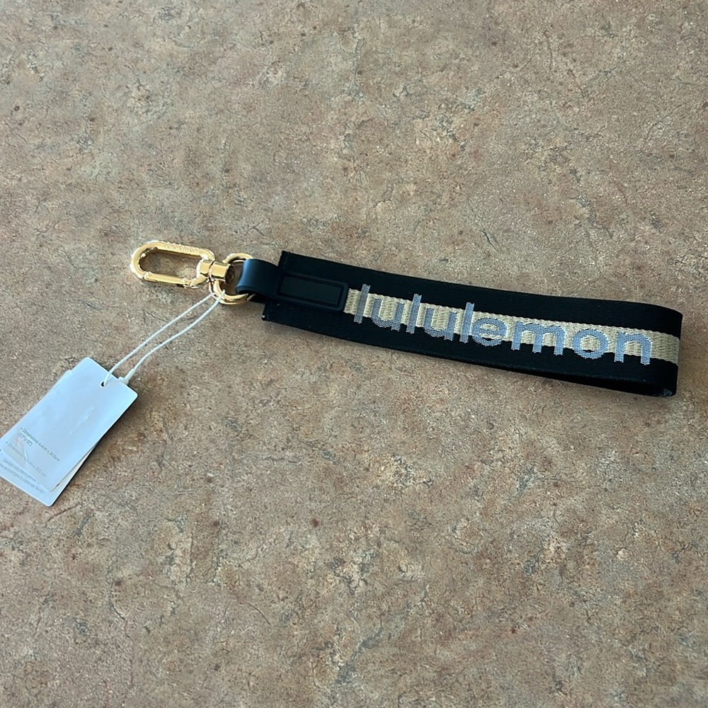 Lululemon Never Lost Keychain - Black and Gold